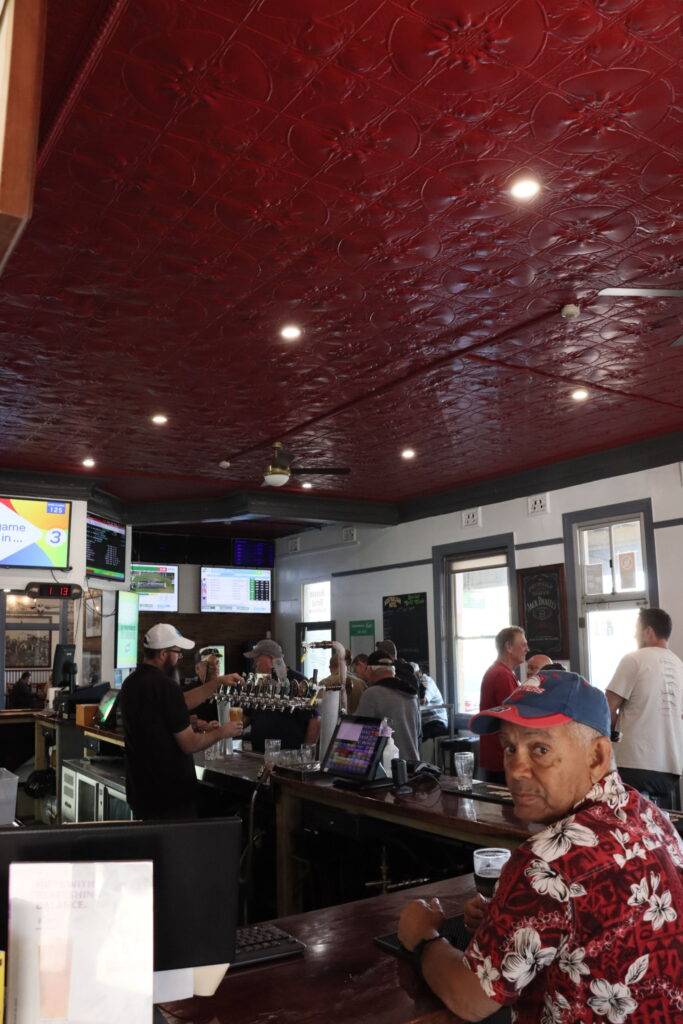 Walk intothe public bar with the heritage pressed ceilings 