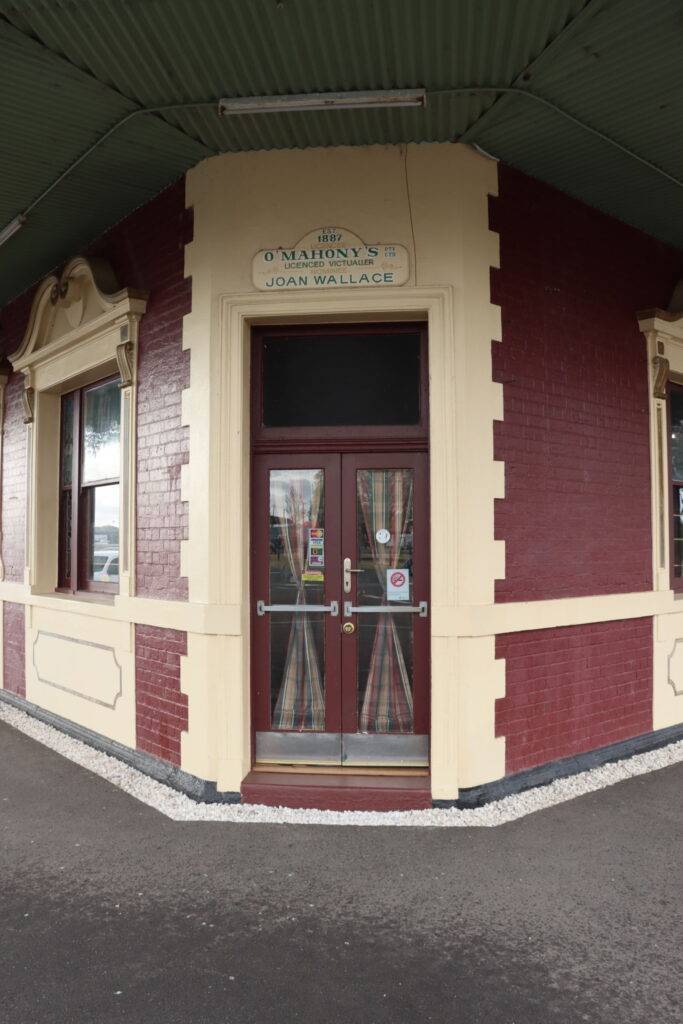 two entrances with "PRIVATE ENTRANCE" lettered in the above the door