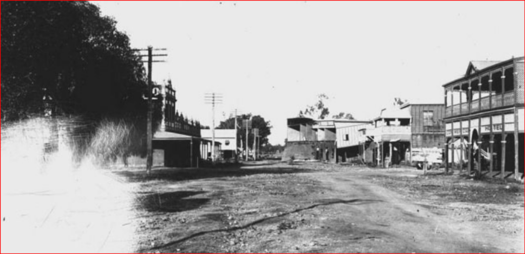 Commercial Hotel on the right after the 1916 flood